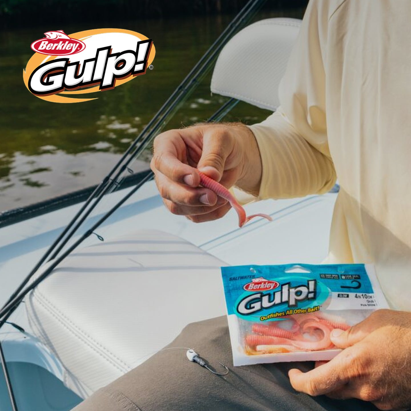 Person holding a Berkley Gulp! fishing lure package on a boat